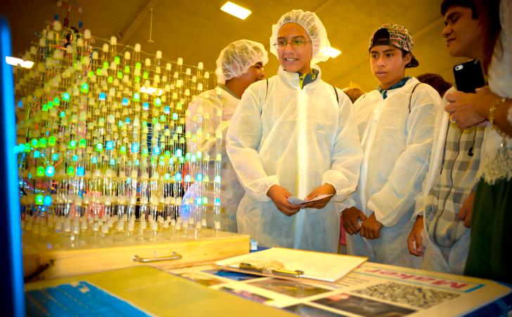 Group of young boys learning about digital science